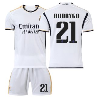 Otroški Nogometni dresi Real Madrid Domači 23-24 Kratek Rokav + Kratke hlače RODRYGO 21 prodajo