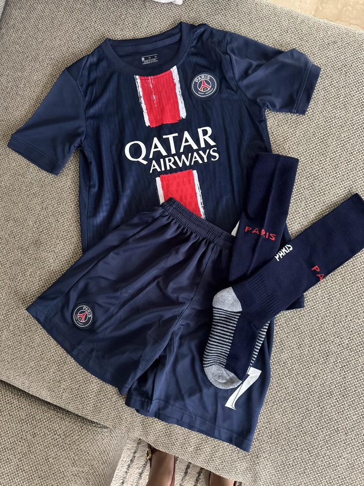 https://www.shopnogometni.com/wp-content/uploads/2025/05/Kylian-Mbappe-dresi.png