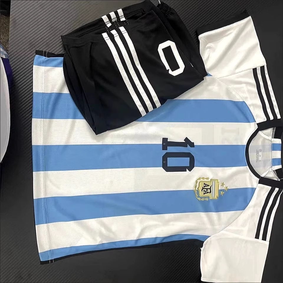 https://www.shopnogometni.com/wp-content/uploads/2025/05/Nogometni-dresi-kompleti-Argentina.png