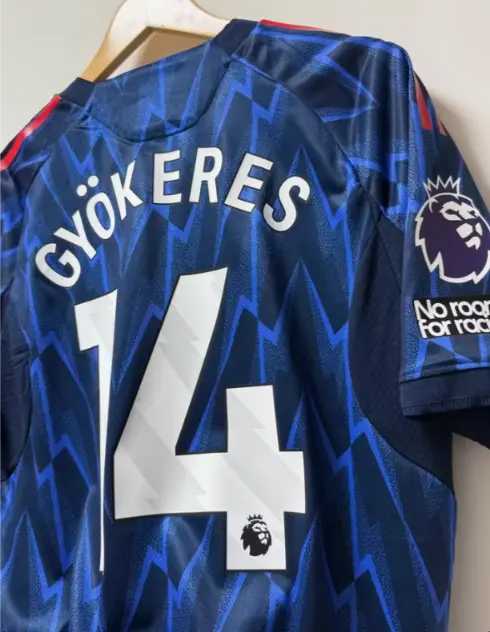 Nogometni dresi Arsenal Gostujoci 2025-26 modra.webp