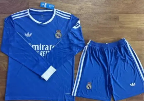 Prodajo Otroski dresi kompleti Real Madrid Tretji 2025-26 Dolgi Rokav.webp