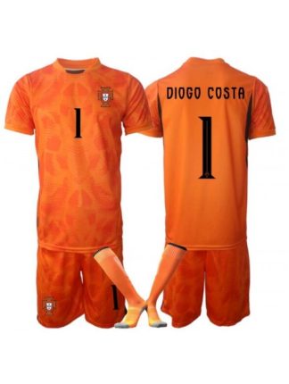 Poceni Nogometni dresi kompleti Portugalska SP 2026 Diogo Costa #1 Vratar Gostujoči oranžna